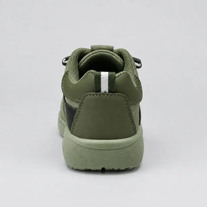 Rear view of green Trail kids sneaker with heel pull tab
