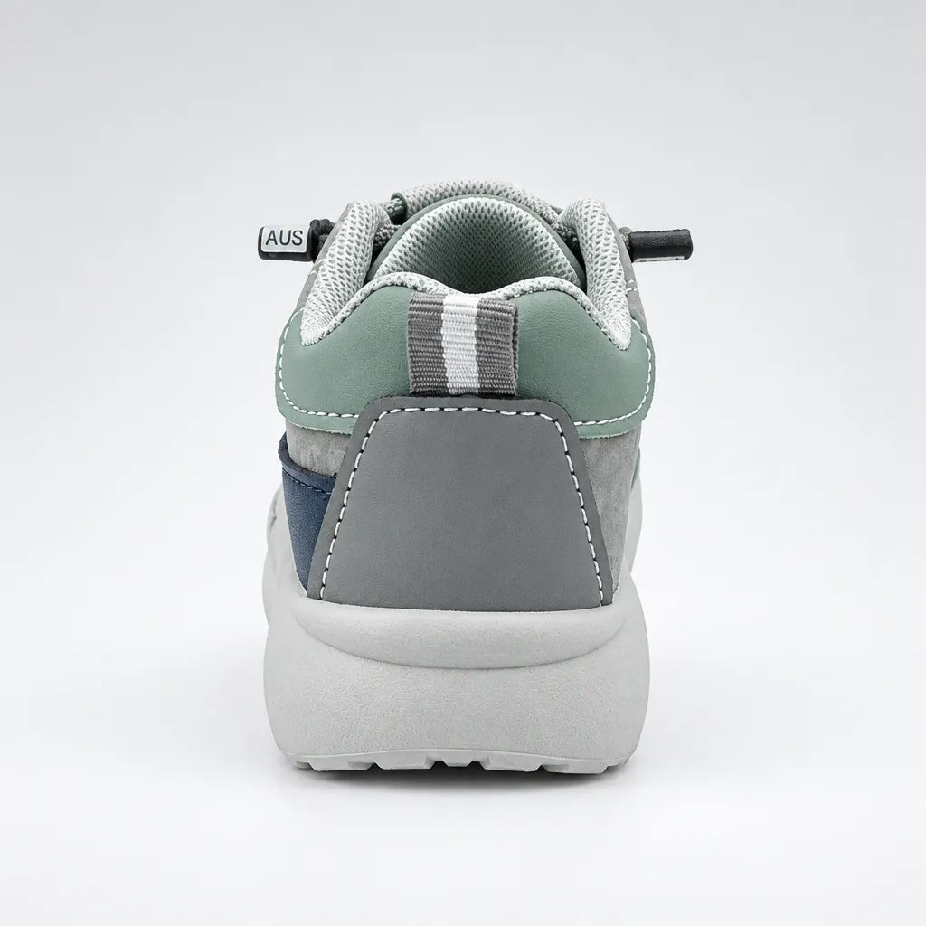 Back view of grey-toned Trail kids sneaker listed as Beige, with pale green collar panel