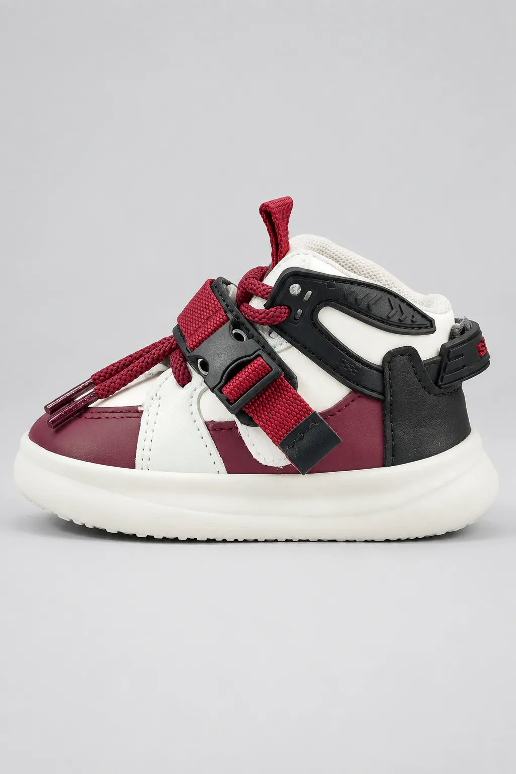 Kids high-top sneakers in burgundy, white, and black with padded collar