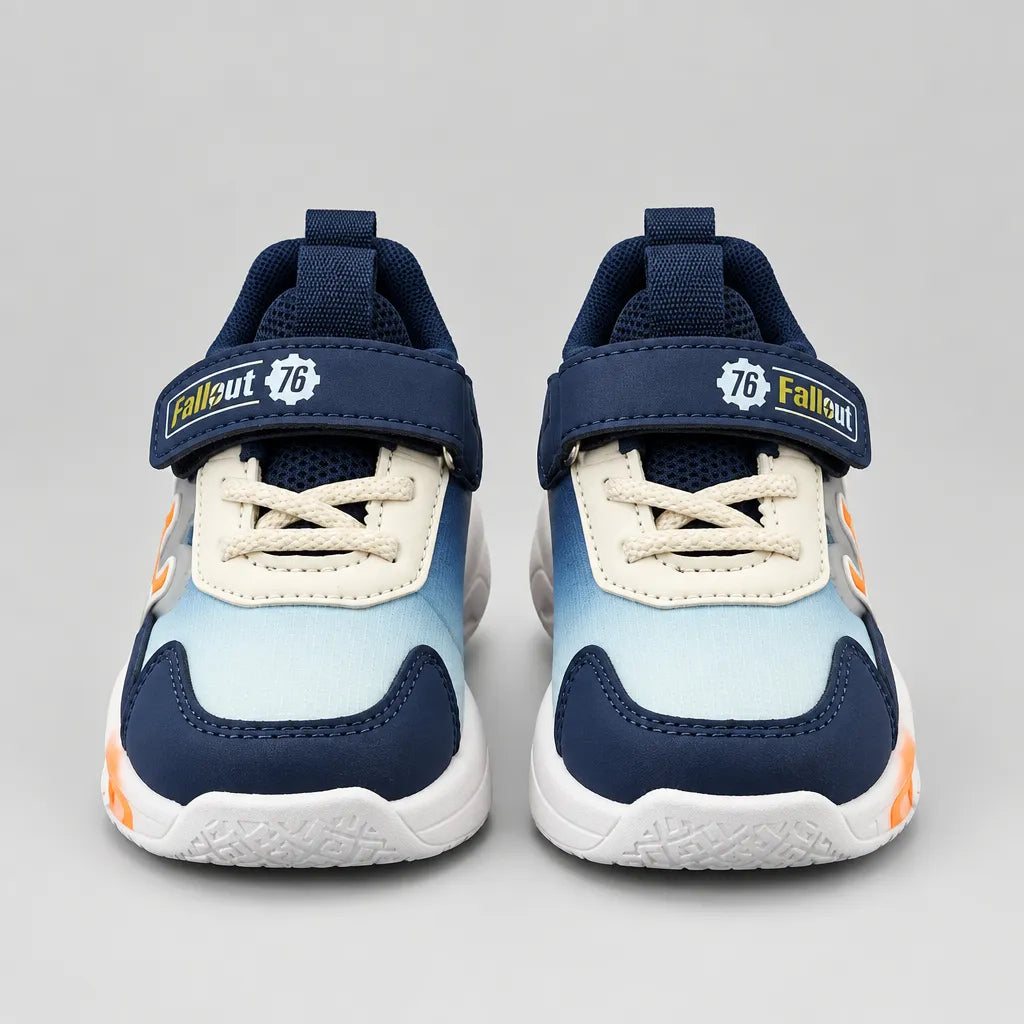 Navy and blue No.1 light-up kids sneaker with orange accents, outer side view