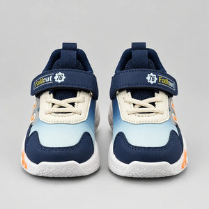 Navy and blue No.1 light-up kids sneaker with orange accents, outer side view