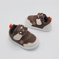 Brown kids' sneakers with bear appliques, white sole and bright orange lace tabs