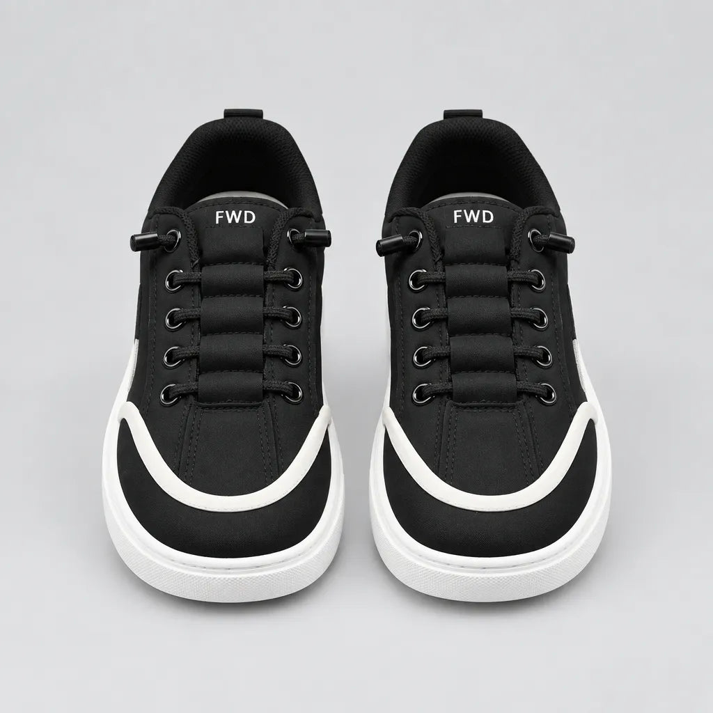 Black DuoTrim kids sneaker with white contrast detailing and chunky white sole