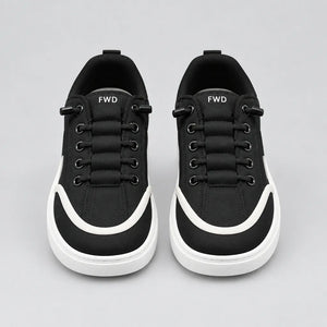 Black DuoTrim kids sneaker with white contrast detailing and chunky white sole