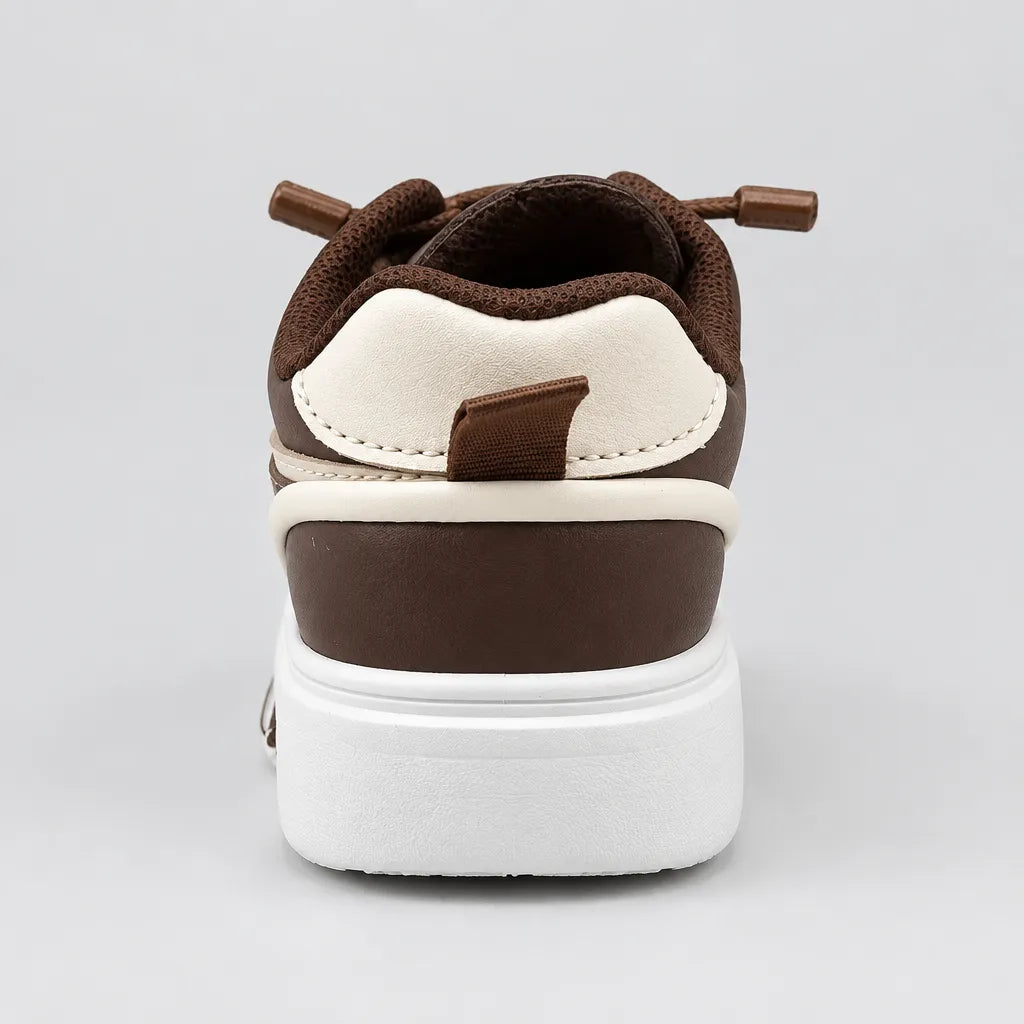 Rear view of Brown DuoTrim kids sneaker showing white heel panel and brown pull tab
