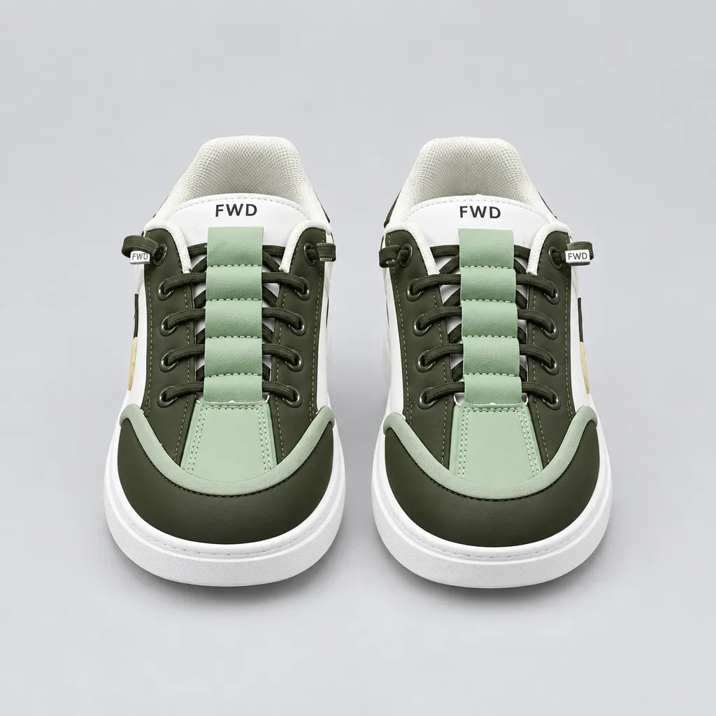 Front view of Pale Green DuoTrim kids sneakers showing green laces and contrast toe panels