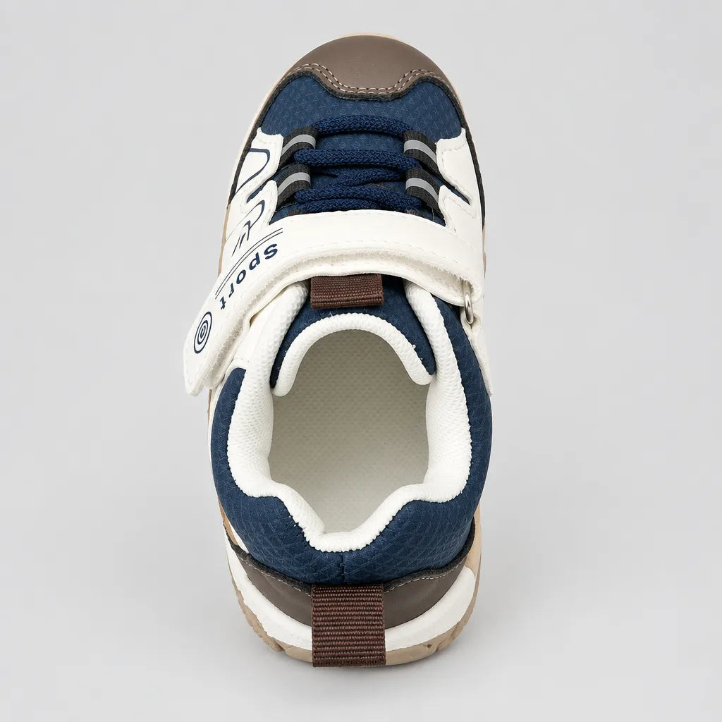 Heel view of navy kids sport sneaker with brown pull tab