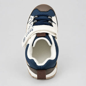 Heel view of navy kids sport sneaker with brown pull tab