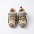 Beige and olive kids sneakers with hook-and-loop strap, side view