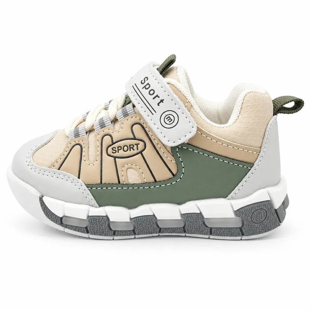 Front view of beige and olive green kids sneakers with grey accents, lace-style detailing and hook-and-loop straps