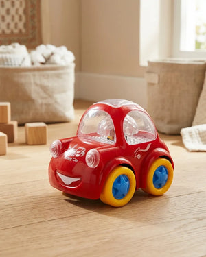 Red bump car toy with clear windshield and blue wheels on a wooden floor