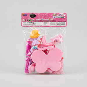 Rear view of the packaged beauty playset showing the closed pink butterfly case, doll and toy accessories