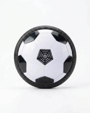 Hover soccer ball with textured black rim and white hex-panel design
