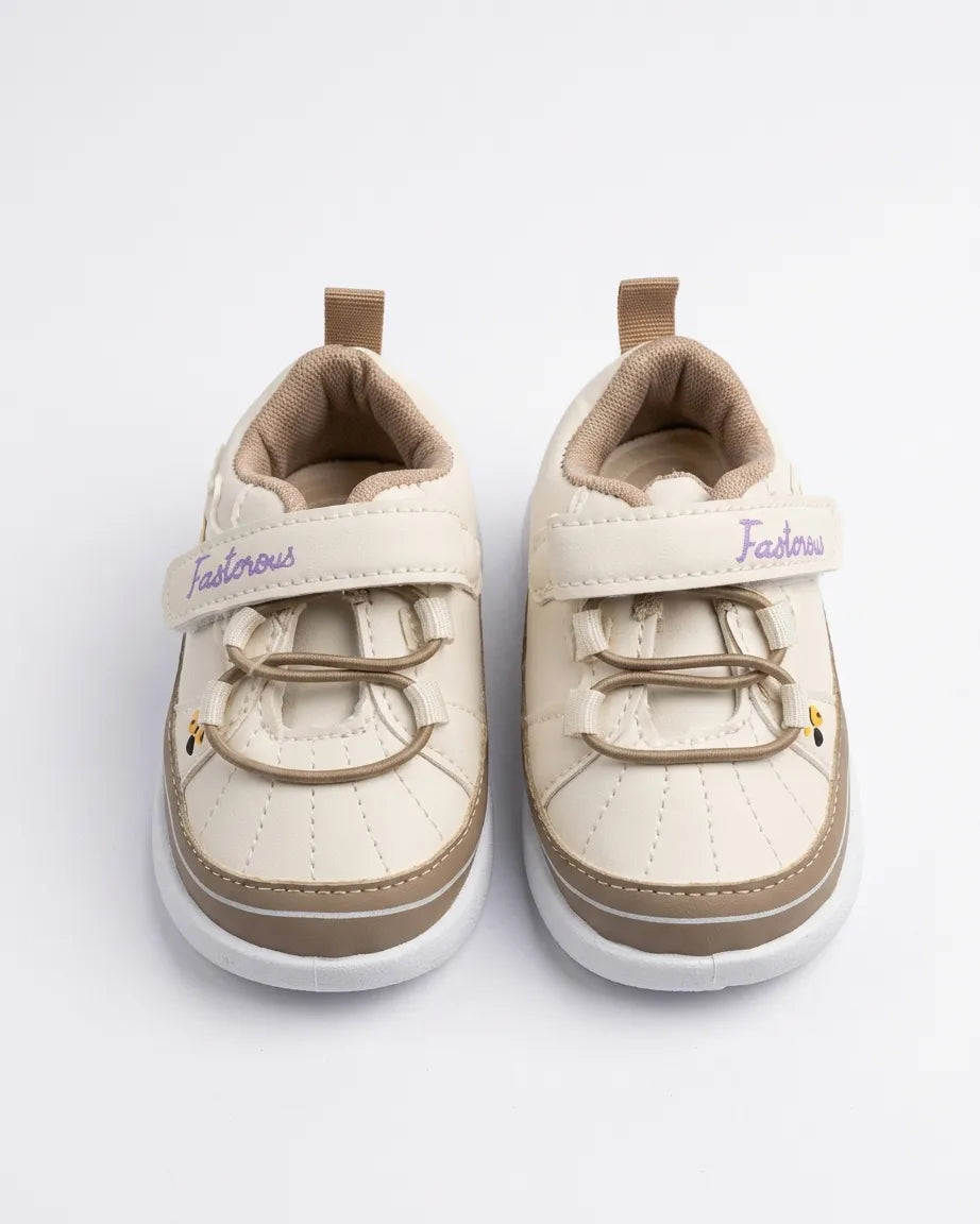 Kids cream and tan cartoon sneakers for kids with hook-and-loop strap and white sole