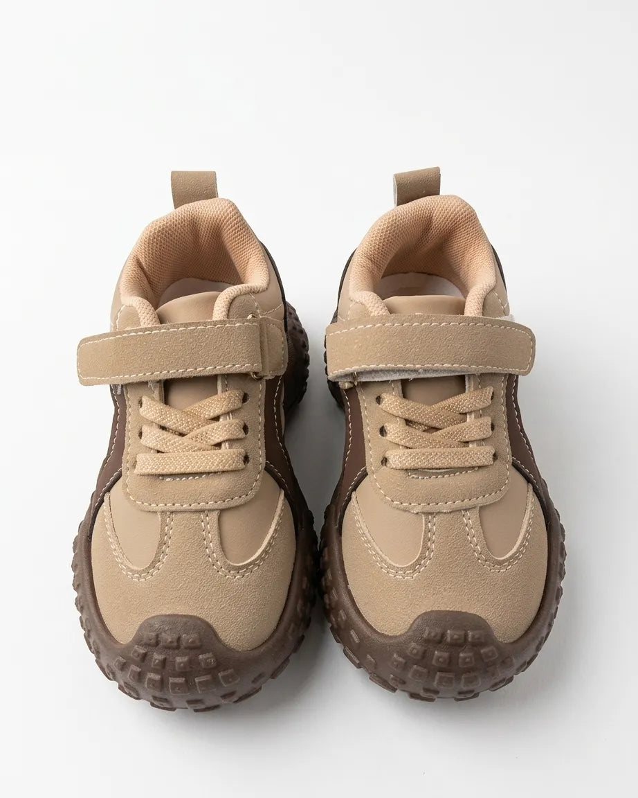 Pair of Cruise beige and brown kids chunky sneakers shown from the front