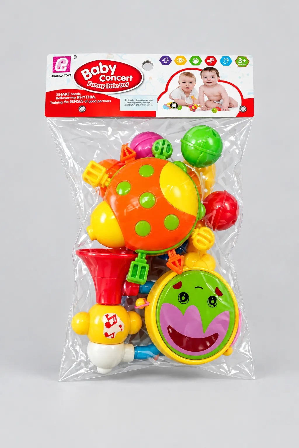 Baby Concert rattle toy pack with colourful rounded rattles, smiling handled toy and trumpet-shaped piece