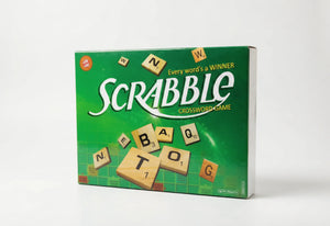 Scrabble crossword board game box, green with letter tiles and SCRABBLE logo